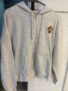 Light Gray Zip-Up Hoodie with Brown Flower Patch